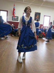 dancers showing their uniforms