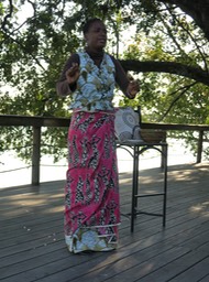 demonstrating wearing a chitenge if "available"
