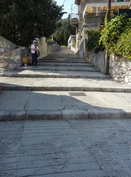 steep walk up to an overlook of the city