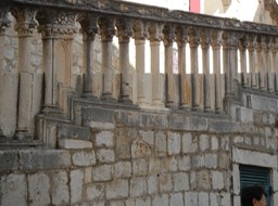 interesting railing on steps; note "modesty" strips along bottom