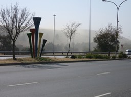 dust blowing onto Soweto from old gold mining slag dump