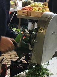 grinding kale for traditional soup
