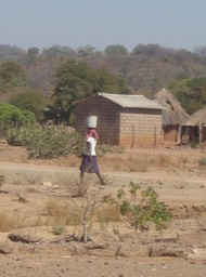 lady with water headed home