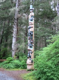 one of many totem poles in the park