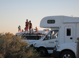 people waiting for sunset at Uluru