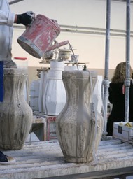 pouring into molds, ceramics factory