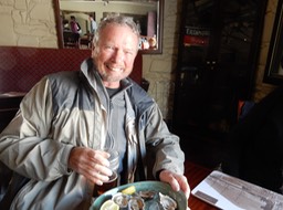 Roger with a great lunch in Cape Town