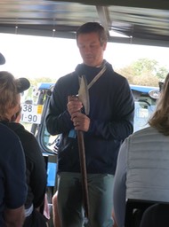 showing a cork axe for cutting cork bark on trees