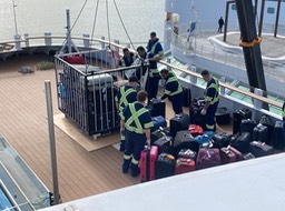 taking our luggage off